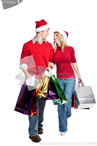 Image of Christmas shopping couple