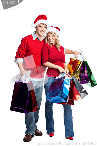 Image of Christmas shopping couple