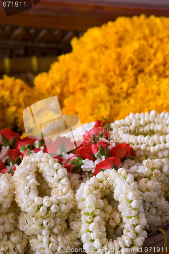 Image of Flower garlands at temple in Thailand