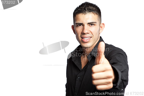 Image of Hispanic businessman giving thumbs up