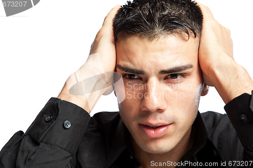 Image of Stressed hispanic businessman