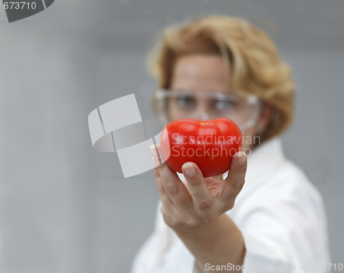 Image of Female Scientist Offering Natural Food