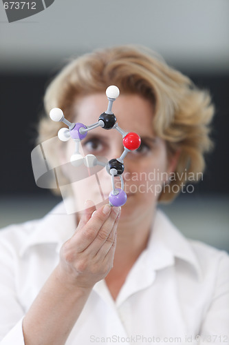 Image of Female Researcher Analyzing A Molecular Structure