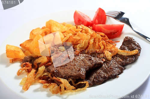 Image of Beef escalopes with crispy onions horizontal