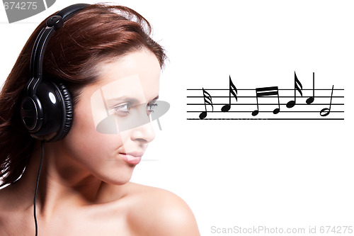 Image of Beautiful woman listening music