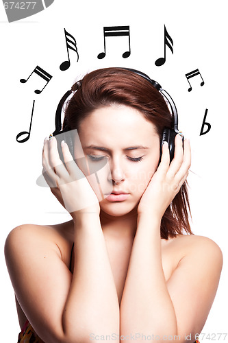 Image of Beautiful woman listening music