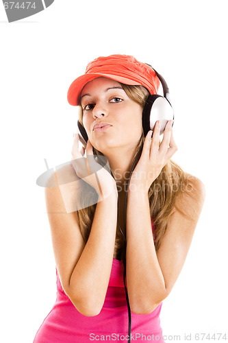 Image of Young woman listen music