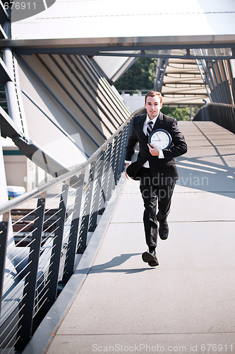 Image of Late caucasian businessman in a rush