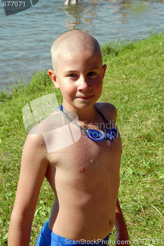 Image of boy in googles on the beach