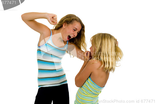 Image of two sister girls having a fight
