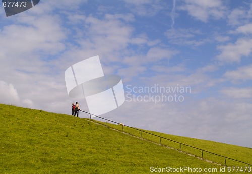 Image of couple on the dike