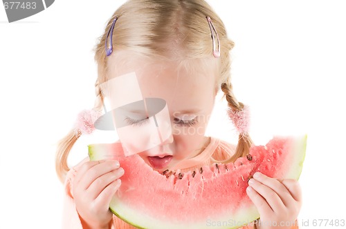 Image of Girl eating watermelon