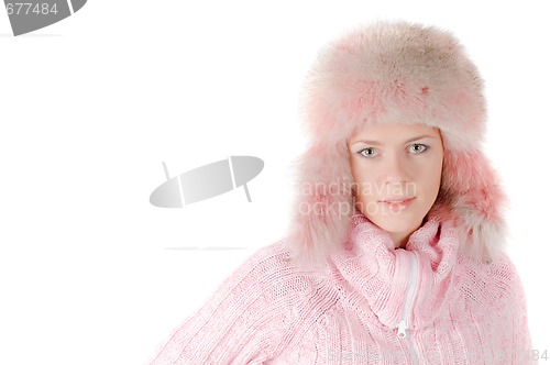 Image of Beautiful woman in a pink fur hat