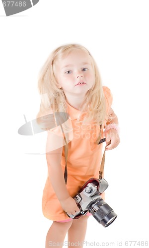 Image of Shot of little girl with camera in studio