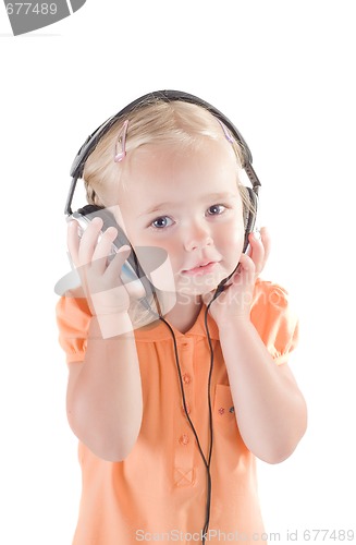 Image of Little girl with headphones