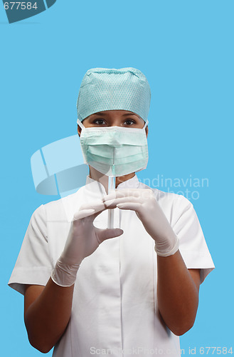 Image of Nurse holding a syringe