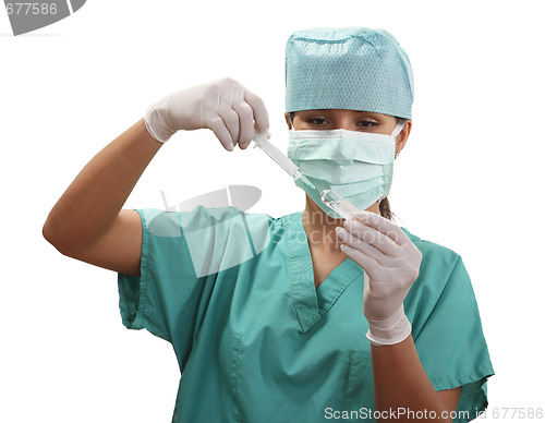 Image of Nurse filling a syringe