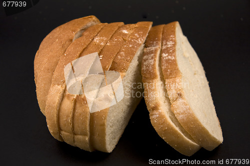 Image of Bread on a black background.