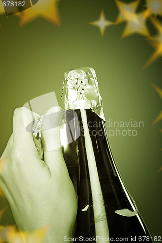 Image of Opening champagne bottle