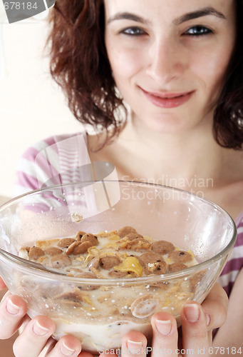 Image of Young people eating milk with cereals