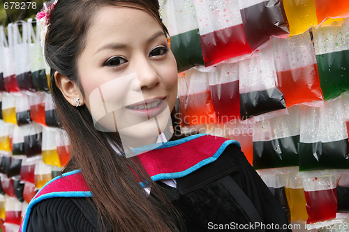 Image of Asian graduate.
