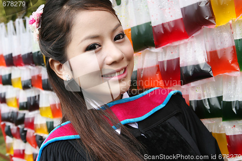 Image of Asian graduate.