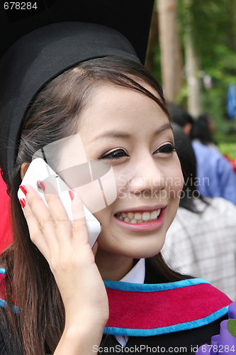 Image of Asian graduate.