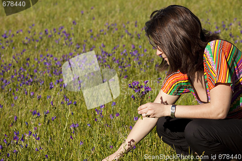 Image of Grabing some fresh spring flowers