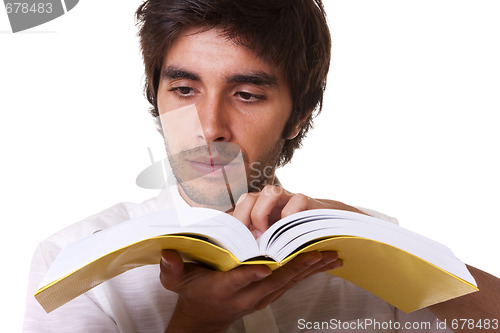 Image of man reading a book