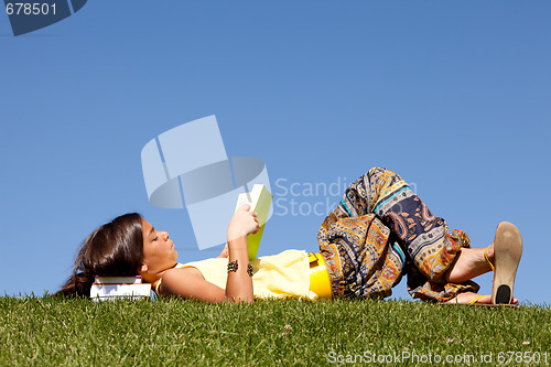 Image of Children reading a book