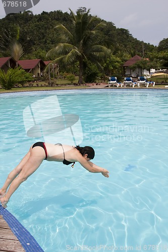 Image of jumping into the pool