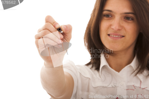 Image of businesswoman writing at the whiteboard