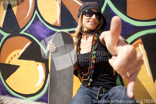 Image of Cool skateboard woman