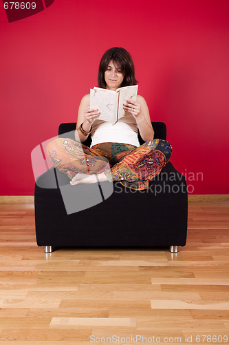 Image of Woman reading a book