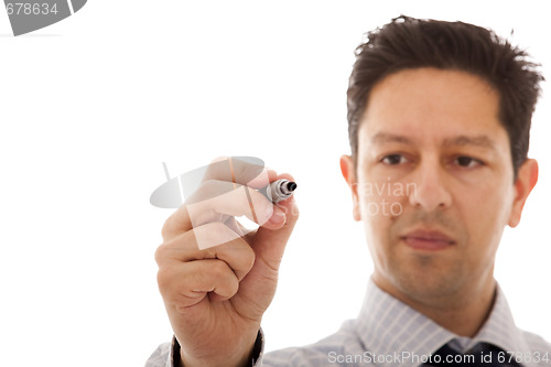 Image of businessman writing at a whiteboard