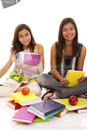 Image of two young student sisters