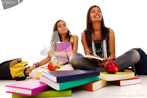 Image of two young student sisters