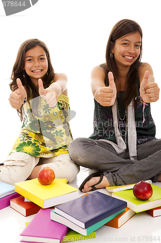 Image of two young student sisters