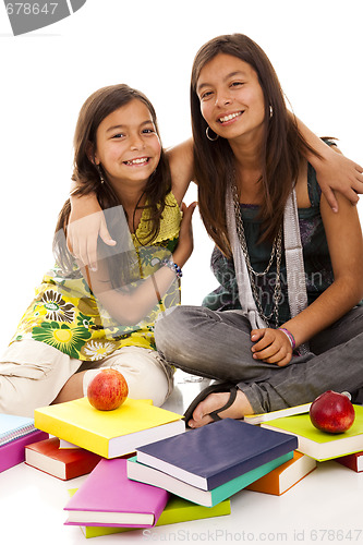Image of two young student sisters