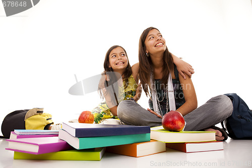 Image of two young student sisters