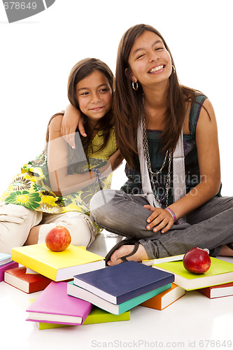 Image of two young student sisters