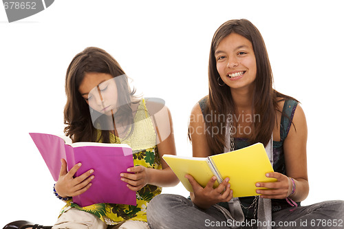 Image of two young student sisters