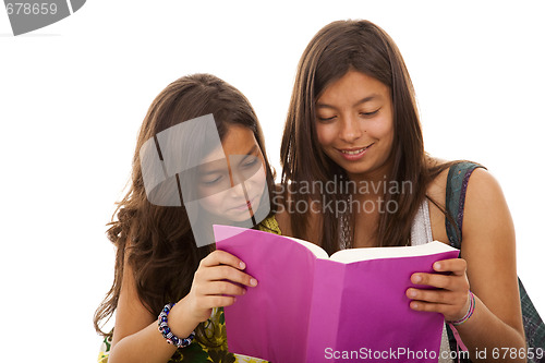 Image of two young student sisters