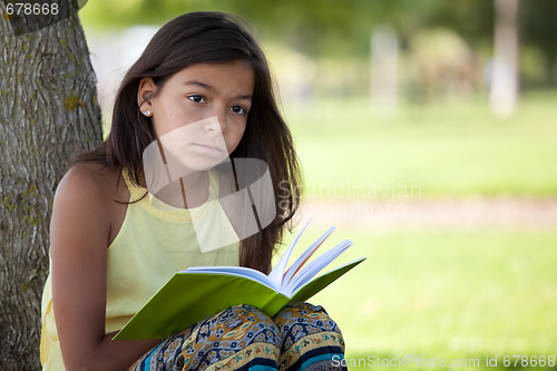 Image of Children reading a book