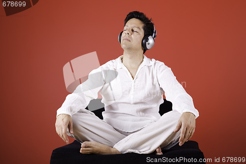 Image of listening music at home