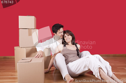 Image of young couple packing 