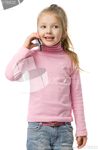Image of little girl talks by mobile phone