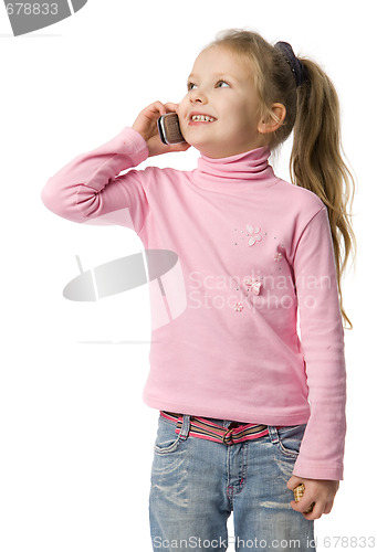 Image of little girl talks by mobile phone