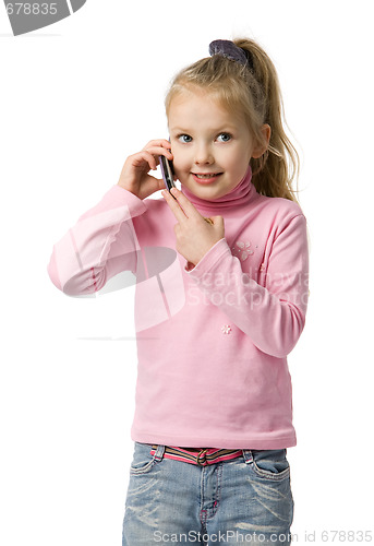 Image of little girl talks by mobile phone
