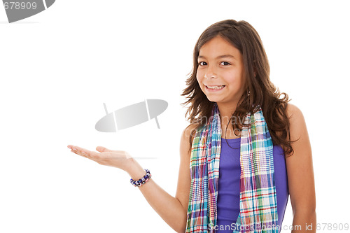 Image of young child showing something